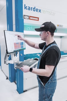 Employee using inventory management software